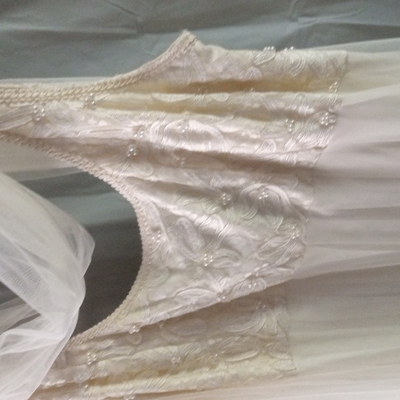 MARIE ST.CLAIR - Picture 4 of 5